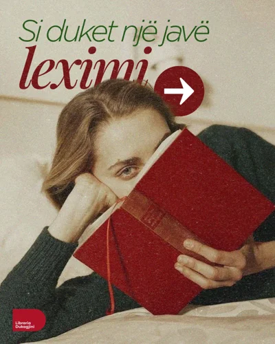 Grua duke lexuar libër me kapak të kuq