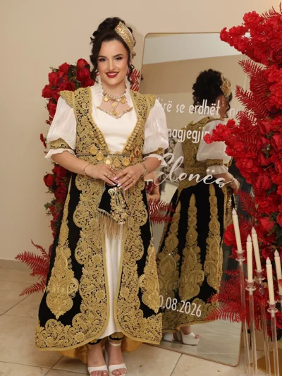 Veshje tradicionale nusërie e zezë dhe ari