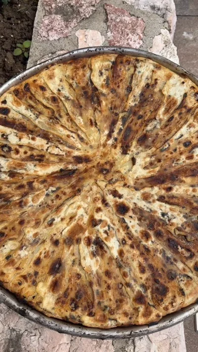 Flija tradicionale e pjekur me saç me dru