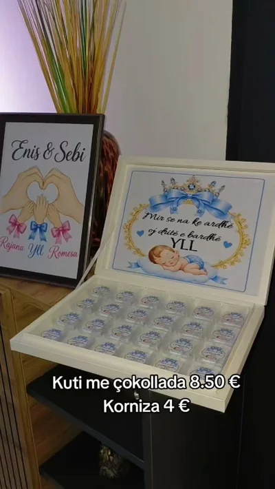 Kuti me çokollata për bebe dhe kornizë
