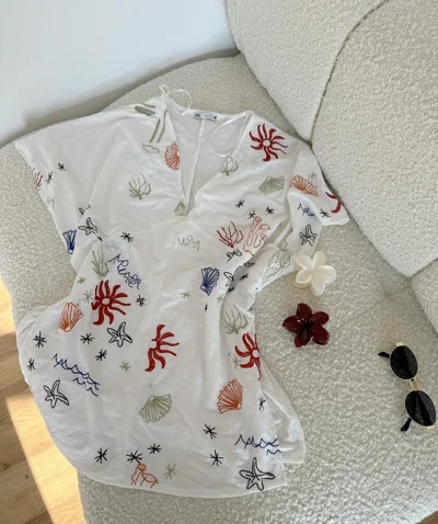 Bluzë e bardhë me motive deti, masa S