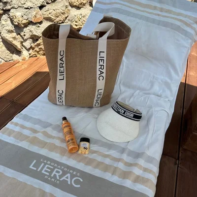 Çantë plazhi Lierac dhe krem dielli Sunissime