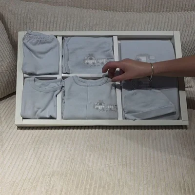 Set rrobash për bebe blu të çelët