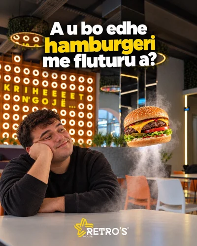 Hamburger me pomfrit në restorant