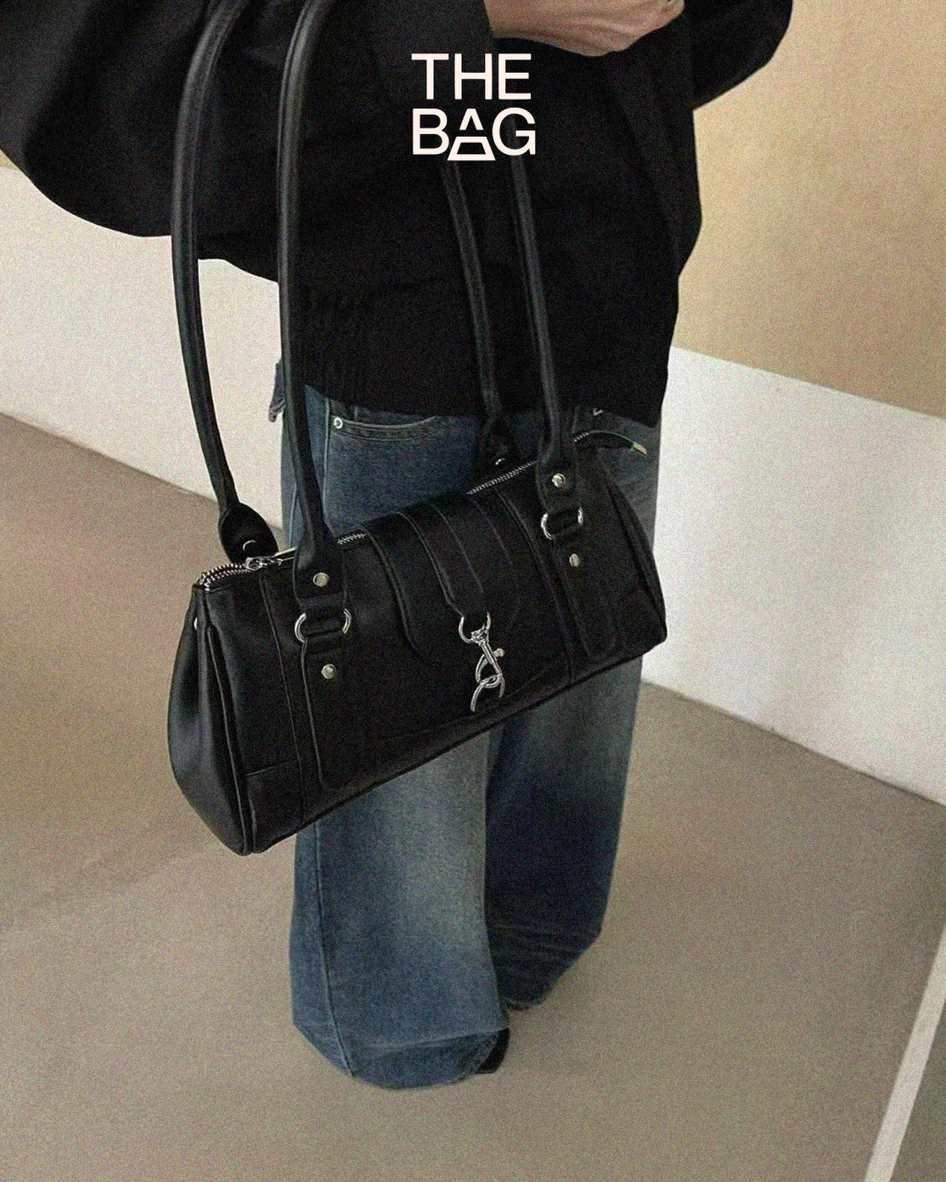 Çantë supi e zezë e zgjatur – The Bag