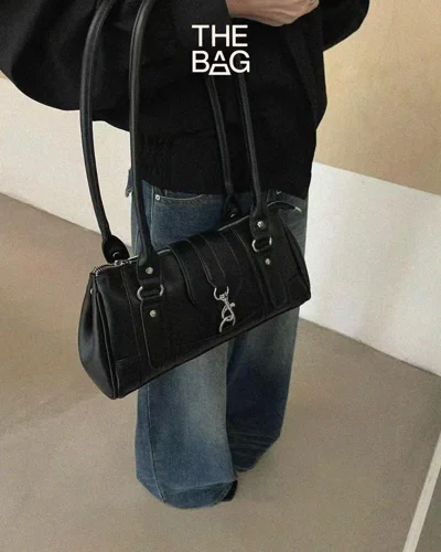 Çantë supi e zezë e zgjatur