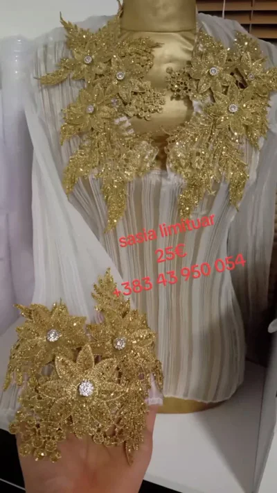 Këmishë e bardhë me qëndisje ari