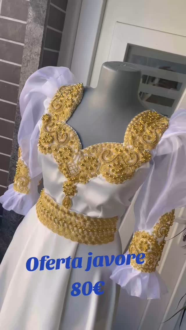 Fustan i bardhë tradicional me qëndisje ari – veshje.Prizren