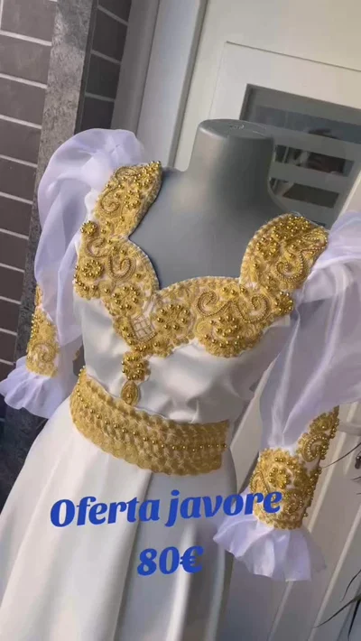Fustan i bardhë tradicional me qëndisje ari