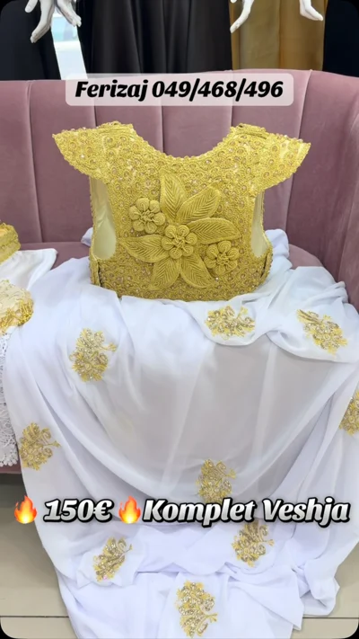 Komplet veshje tradicionale e bardhë me jelek ari